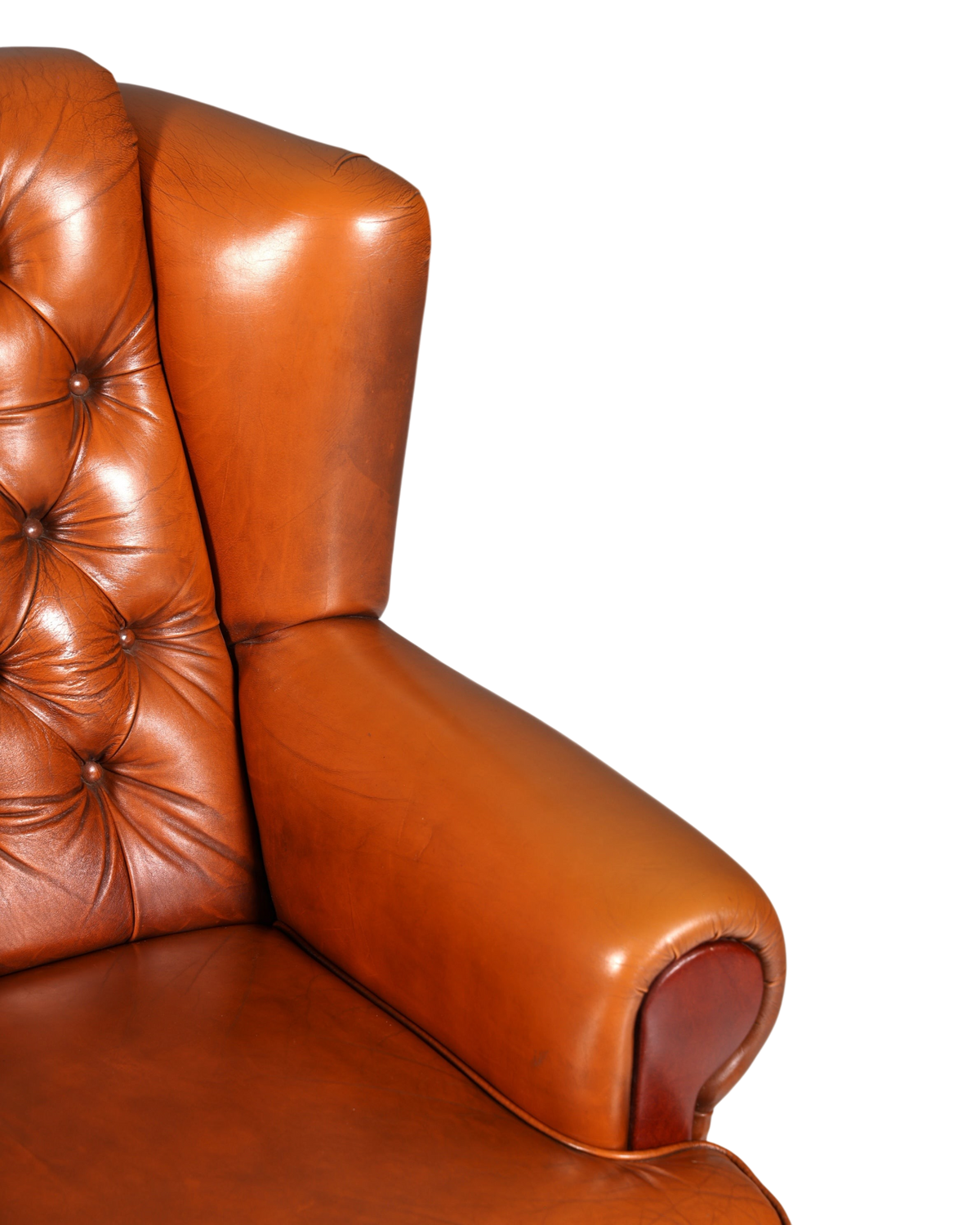 Hauptstadt Möblerei Chesterfield Sessel aus cognacfarbenem Echtleder mit klassischer Knopfheftung und Armlehne