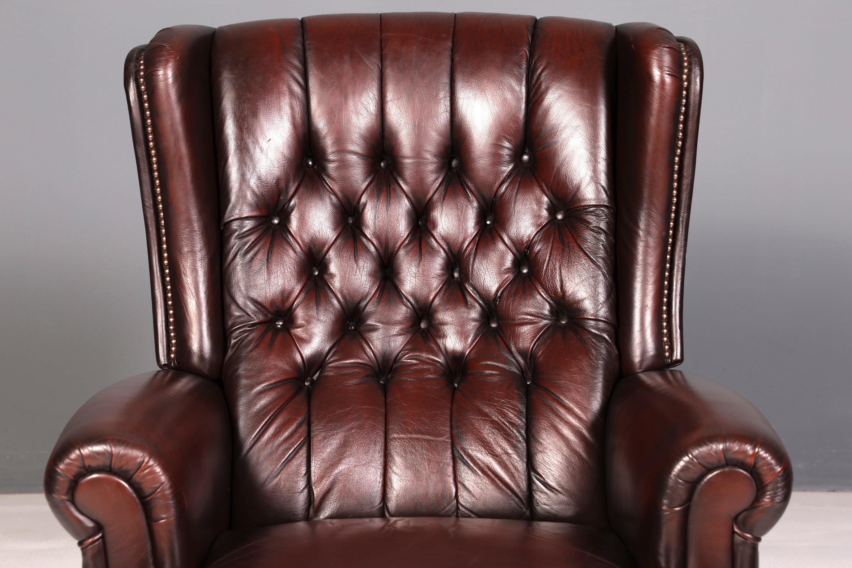 Elegant Chesterfield wingback armchair, recliner, genuine brown leather, TV chair, lounge chair, leather armchair
