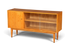 Hauptstadt Möblerei Hellerau Sideboard Modell 602 aus Holz mit Glasschiebetüren im Mid Century Design