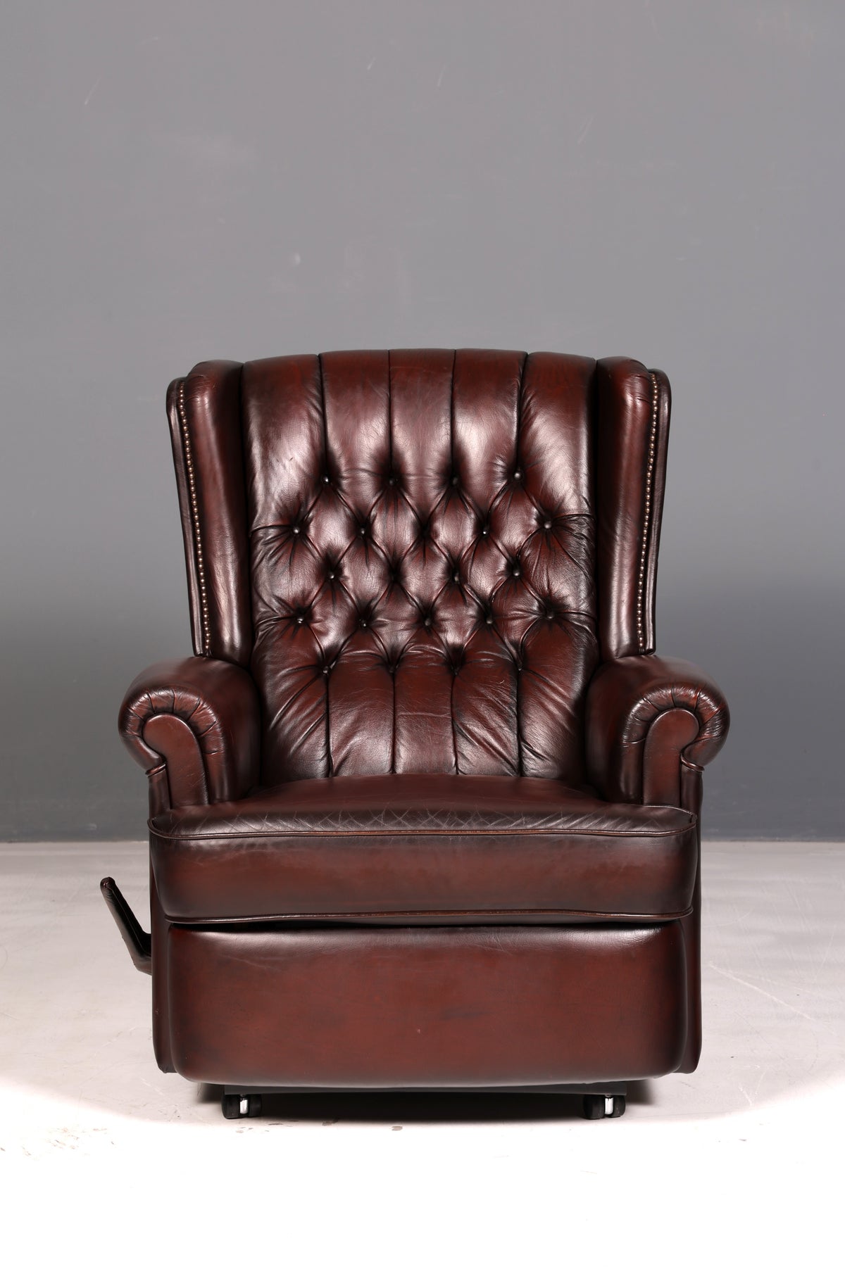 Elegant Chesterfield wingback armchair, recliner, genuine brown leather, TV chair, lounge chair, leather armchair