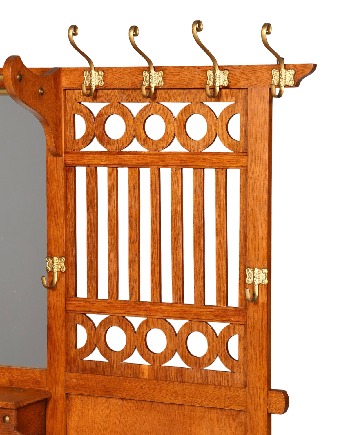 Hauptstadt Möblerei Wandgarderobe aus Eichenholz mit dekorativen Kreismustern und goldenen Messinghaken