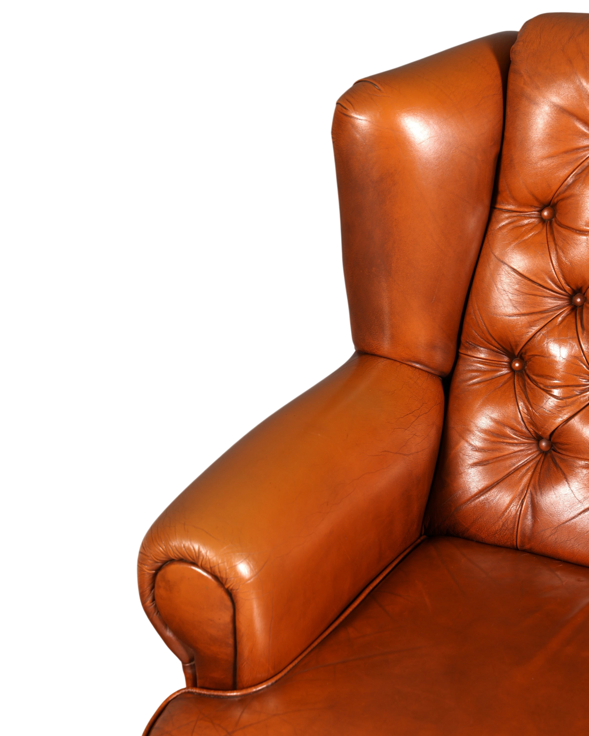 Hauptstadt Möblerei Chesterfield Sessel aus cognacfarbenem Echtleder mit klassischer Knopfheftung und Armlehne