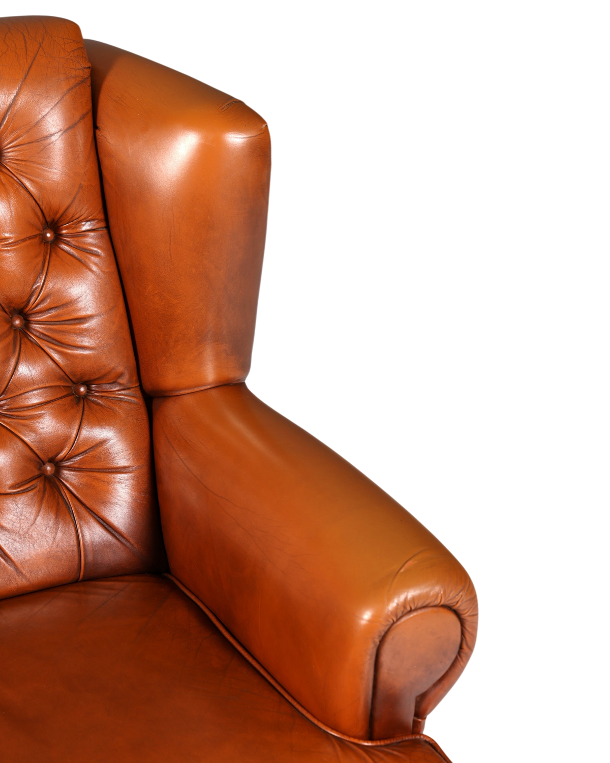 Hauptstadt Möblerei Chesterfield Sessel in cognacfarbenem Echtleder mit klassischer Knopfheftung und Armlehne