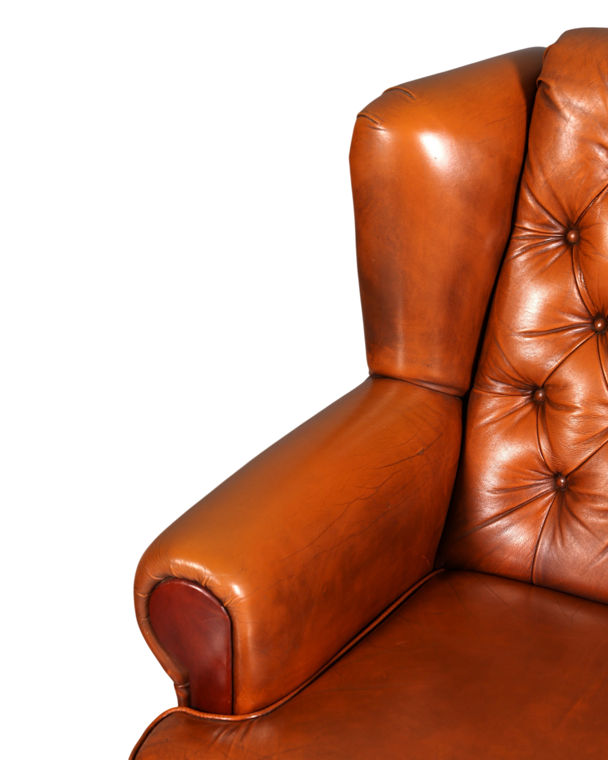 Hauptstadt Möblerei Chesterfield Sessel in cognacfarbenem Echtleder mit klassischer Knopfheftung und Armlehne